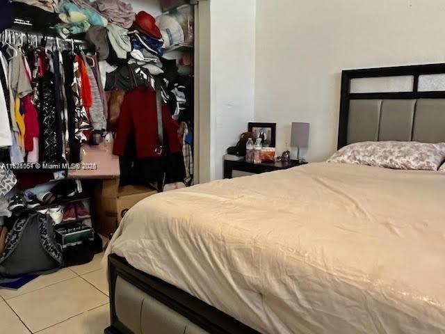 12890 NE 8th Ave Unit 102, North Miami, FL 33161 - view of tiled bedroom