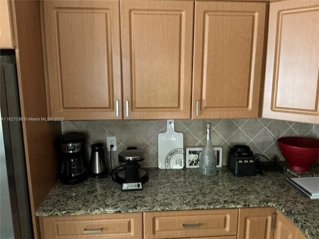 651 SW 176th Ave, Pembroke Pines, FL 33029 - kitchen featuring decorative backsplash, light brown cabinets, and light stone countertops