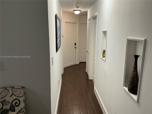 651 SW 176th Ave, Pembroke Pines, FL 33029 - hall with dark wood-style floors and baseboards