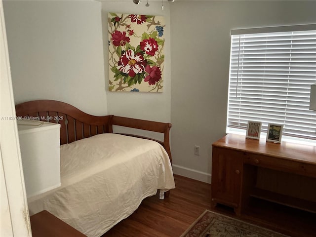 651 SW 176th Ave, Pembroke Pines, FL 33029 - bedroom featuring wood finished floors and baseboards