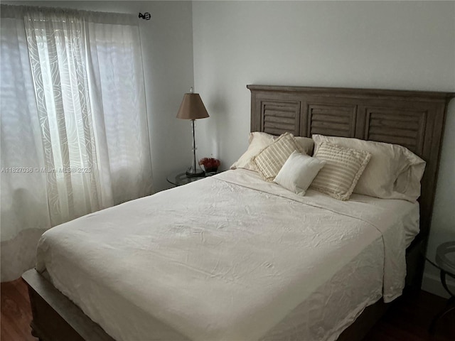 651 SW 176th Ave, Pembroke Pines, FL 33029 - bedroom featuring dark wood finished floors