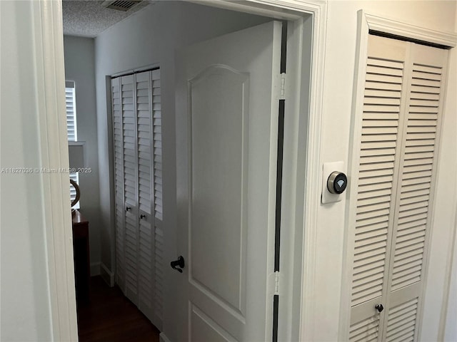 651 SW 176th Ave, Pembroke Pines, FL 33029 - corridor featuring dark wood finished floors