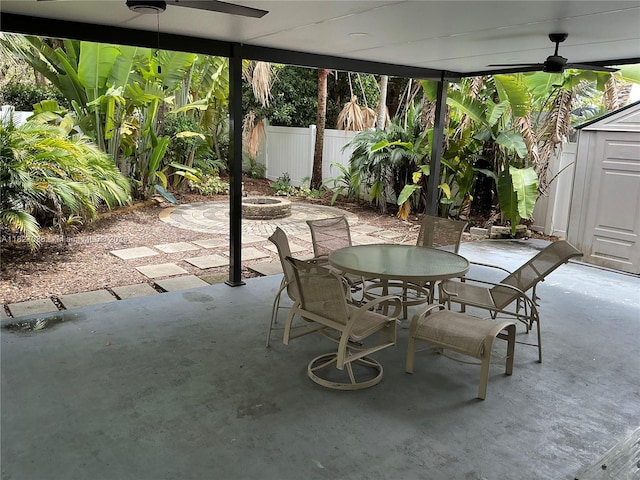 651 SW 176th Ave, Pembroke Pines, FL 33029 - view of patio with outdoor dining space, a ceiling fan, and a storage unit