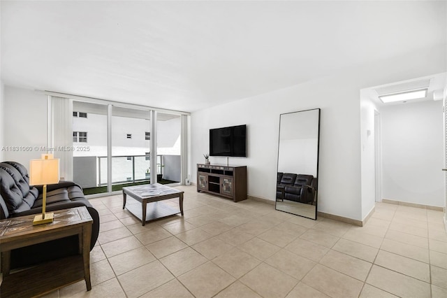 1200 W Ave Unit 1419, Miami Beach, FL 33139 - living area featuring light tile patterned floors and floor to ceiling windows