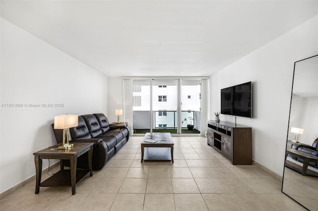 1200 W Ave Unit 1419, Miami Beach, FL 33139 - living area featuring light tile patterned floors and expansive windows
