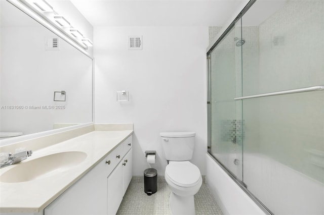 1200 W Ave Unit 1419, Miami Beach, FL 33139 - bathroom with vanity, bath / shower combo with glass door, and tile patterned floors