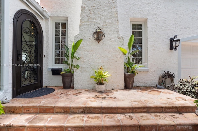 1320 Obispo Ave, Coral Gables, FL 33134 - doorway to property featuring stucco siding