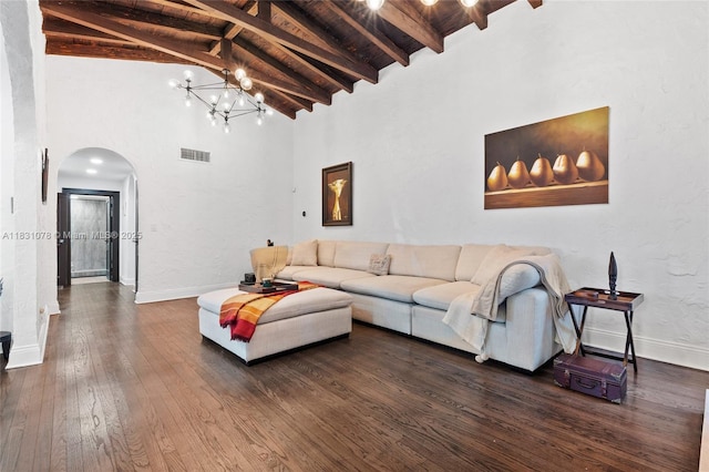 1320 Obispo Ave, Coral Gables, FL 33134 - living area featuring arched walkways, a chandelier, hardwood / wood-style flooring, high vaulted ceiling, and a wooden ceiling with exposed beams