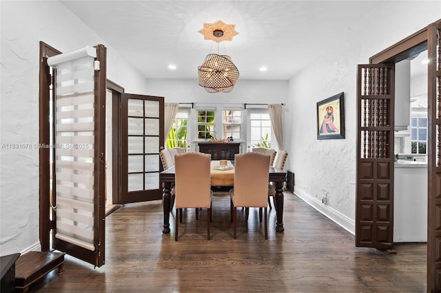 1320 Obispo Ave, Coral Gables, FL 33134 - dining space featuring dark wood-style flooring, a textured wall, and recessed lighting