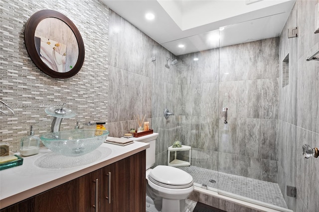 1320 Obispo Ave, Coral Gables, FL 33134 - bathroom featuring a stall shower, tile walls, backsplash, vanity, and recessed lighting