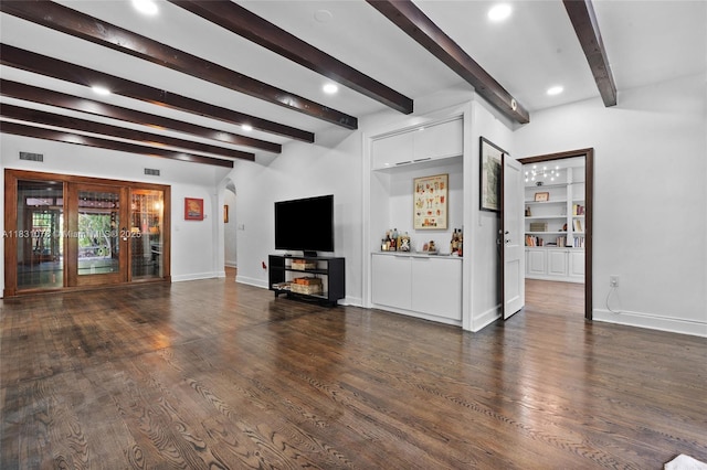 1320 Obispo Ave, Coral Gables, FL 33134 - unfurnished living room featuring arched walkways, a dry bar, beam ceiling, dark wood-style flooring, and recessed lighting