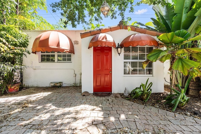 1320 Obispo Ave, Coral Gables, FL 33134 - entrance to property with stucco siding