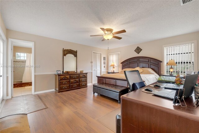 6740 NW 45th St, Lauderhill, FL 33319 - bedroom featuring light wood-type flooring, a closet, an office area, and ceiling fan