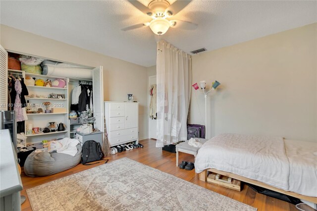 6740 NW 45th St, Lauderhill, FL 33319 - bedroom featuring wood finished floors, a closet, and ceiling fan
