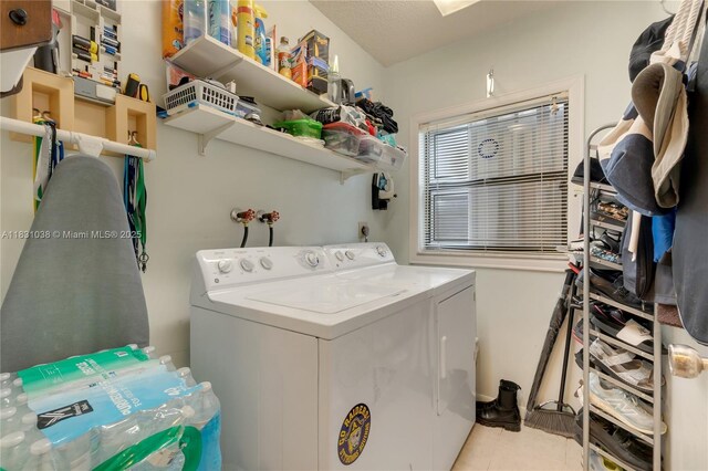 6740 NW 45th St, Lauderhill, FL 33319 - washroom featuring washer and dryer and light tile patterned floors
