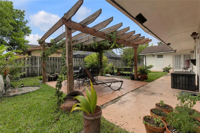 6740 NW 45th St, Lauderhill, FL 33319 - view of patio / terrace featuring a pergola and french doors