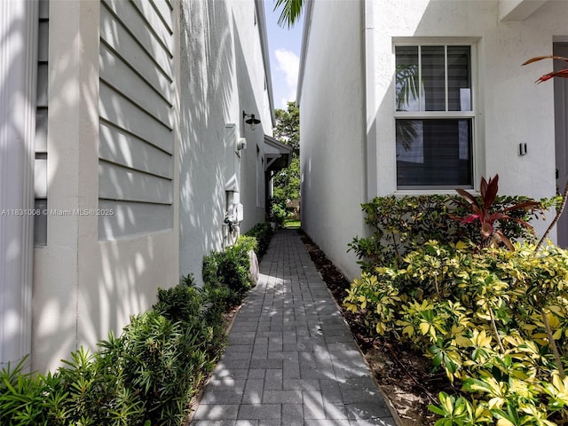 4923 NW 48th Ter, Tamarac, FL 33319 - view of side of home featuring stucco siding
