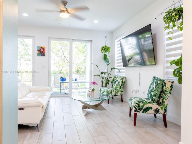 4923 NW 48th Ter, Tamarac, FL 33319 - living area with healthy amount of natural light, a ceiling fan, and recessed lighting