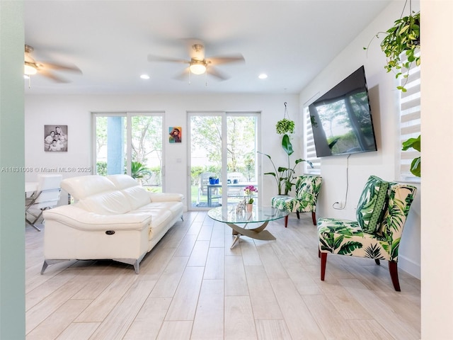 4923 NW 48th Ter, Tamarac, FL 33319 - living room with a ceiling fan, light wood-type flooring, and recessed lighting