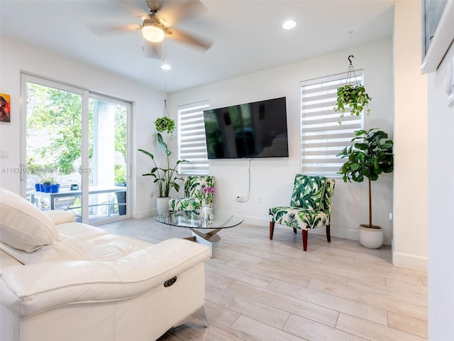 4923 NW 48th Ter, Tamarac, FL 33319 - living room with a ceiling fan, recessed lighting, and light wood finished floors