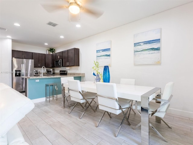 4923 NW 48th Ter, Tamarac, FL 33319 - dining space with light wood-style flooring, recessed lighting, and ceiling fan