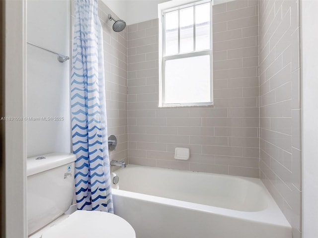 4923 NW 48th Ter, Tamarac, FL 33319 - bathroom featuring toilet and shower / bathtub combination with curtain