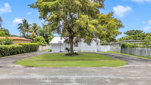 201 S Biscayne River Dr, Miami, FL 33169 - obstructed view of property featuring asphalt driveway