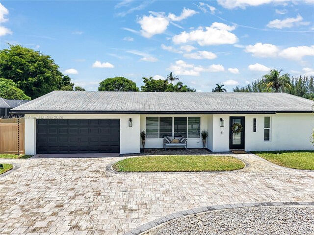 10401 NW 21st St, Pembroke Pines, FL 33026 - single story home featuring decorative driveway, stucco siding, and an attached garage