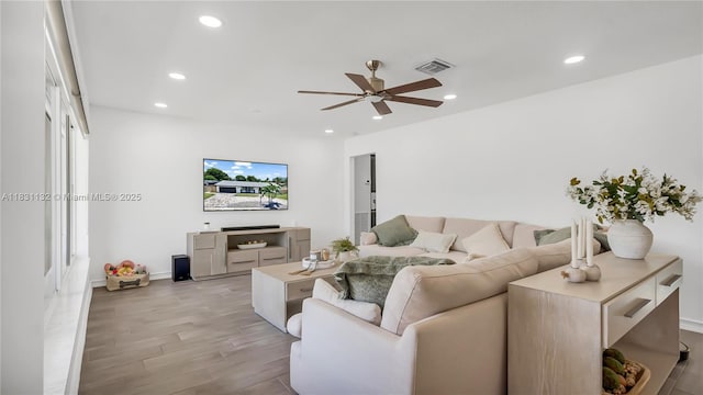 10401 NW 21st St, Pembroke Pines, FL 33026 - living room featuring light wood-style floors, ceiling fan, and recessed lighting