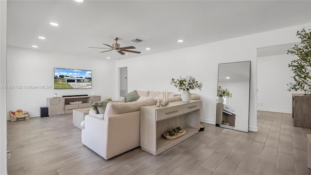 10401 NW 21st St, Pembroke Pines, FL 33026 - living room with light wood-style flooring, ceiling fan, and recessed lighting