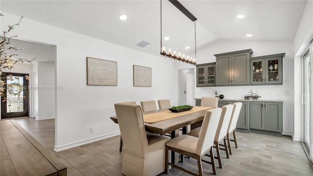 10401 NW 21st St, Pembroke Pines, FL 33026 - dining room featuring wood finish floors, vaulted ceiling, and recessed lighting