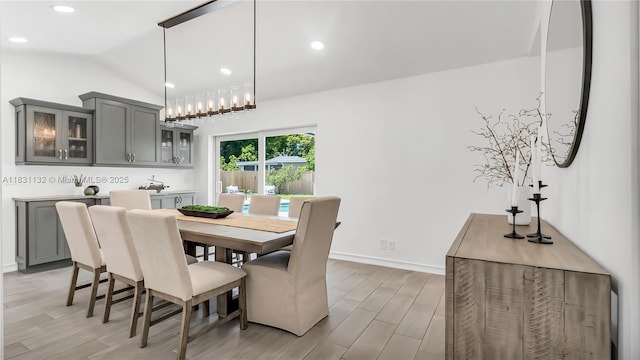 10401 NW 21st St, Pembroke Pines, FL 33026 - dining area with light wood-style flooring, vaulted ceiling, and recessed lighting