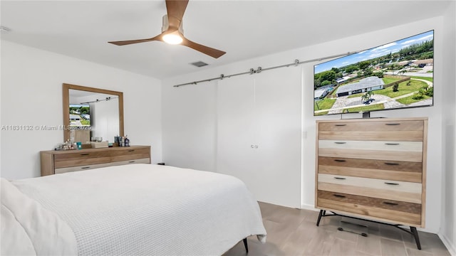 10401 NW 21st St, Pembroke Pines, FL 33026 - bedroom with a ceiling fan and light wood finished floors