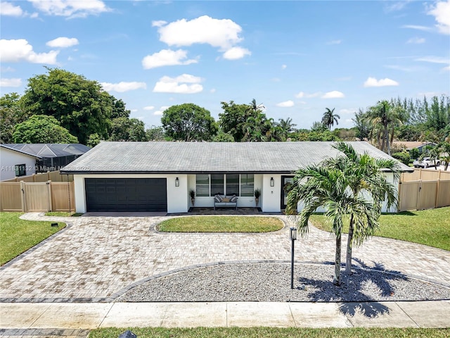 10401 NW 21st St, Pembroke Pines, FL 33026 - ranch-style home featuring a garage, decorative driveway, stucco siding, and a gate