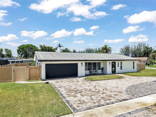10401 NW 21st St, Pembroke Pines, FL 33026 - ranch-style home with stucco siding, a garage, decorative driveway, and a gate