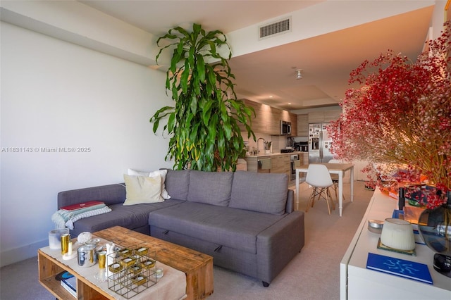 121 NE 34th St Unit 3110, Miami, FL 33137 - living room with light colored carpet