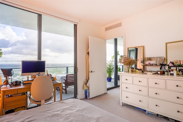 121 NE 34th St Unit 3110, Miami, FL 33137 - bedroom featuring access to outside and light colored carpet