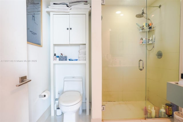 121 NE 34th St Unit 3110, Miami, FL 33137 - bathroom featuring a stall shower and toilet