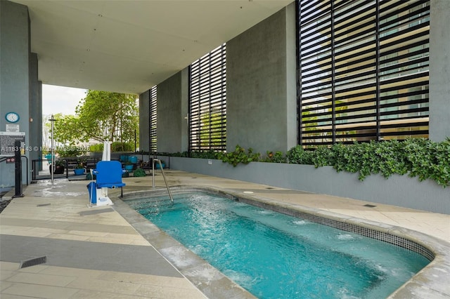 121 NE 34th St Unit 3110, Miami, FL 33137 - view of pool with a pool and a patio