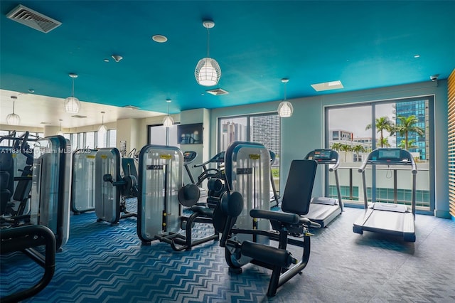 121 NE 34th St Unit 3110, Miami, FL 33137 - exercise room with carpet