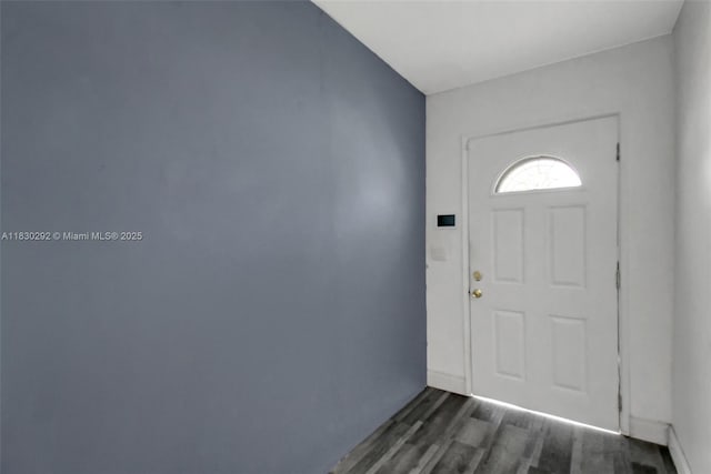 4917 SW 43rd Ter, Dania Beach, FL 33314 - entrance foyer with dark wood finished floors and baseboards