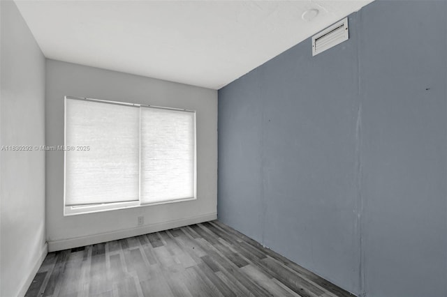 4917 SW 43rd Ter, Dania Beach, FL 33314 - spare room featuring wood finished floors