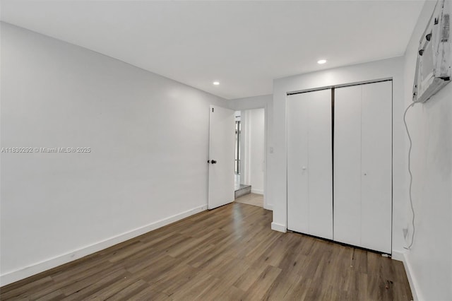 4917 SW 43rd Ter, Dania Beach, FL 33314 - unfurnished bedroom with wood finished floors, recessed lighting, and a closet