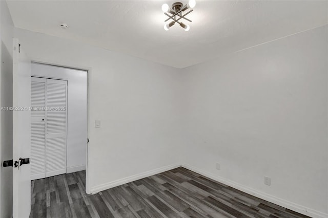 4917 SW 43rd Ter, Dania Beach, FL 33314 - empty room with dark wood-style flooring and a smoke detector