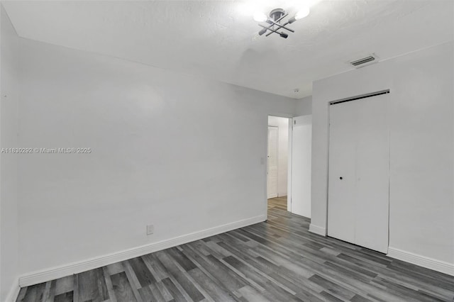 4917 SW 43rd Ter, Dania Beach, FL 33314 - unfurnished bedroom featuring wood finished floors and a closet