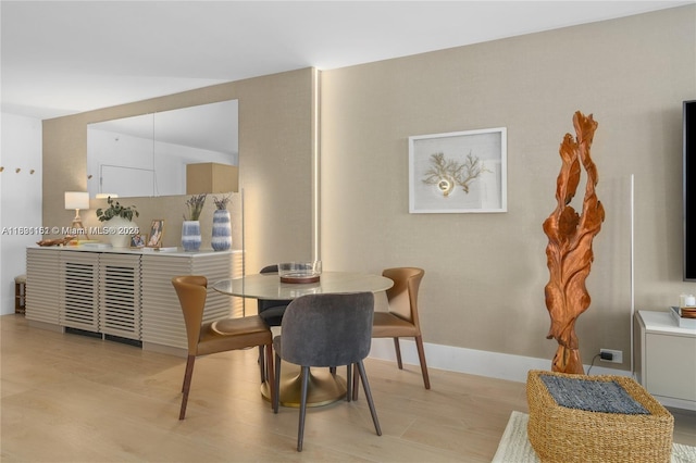 2301 Collins Ave Unit 407, Miami Beach, FL 33139 - dining room with baseboards