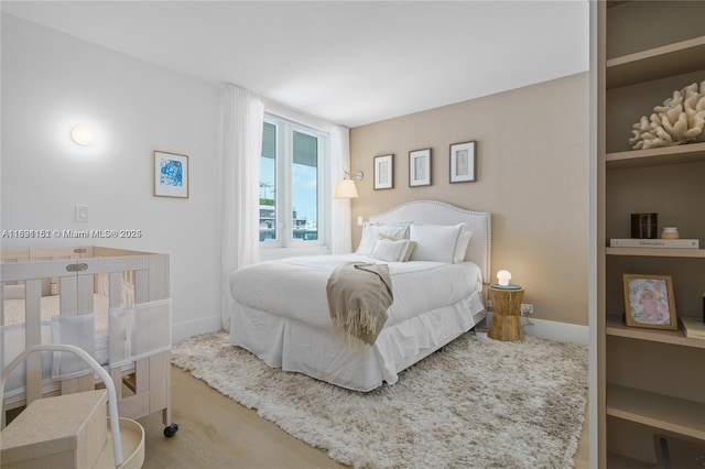 2301 Collins Ave Unit 407, Miami Beach, FL 33139 - bedroom with baseboards