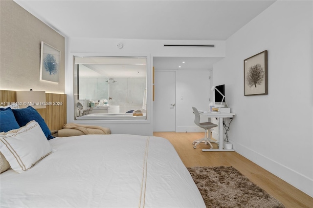 2301 Collins Ave Unit 407, Miami Beach, FL 33139 - bedroom with wood finished floors