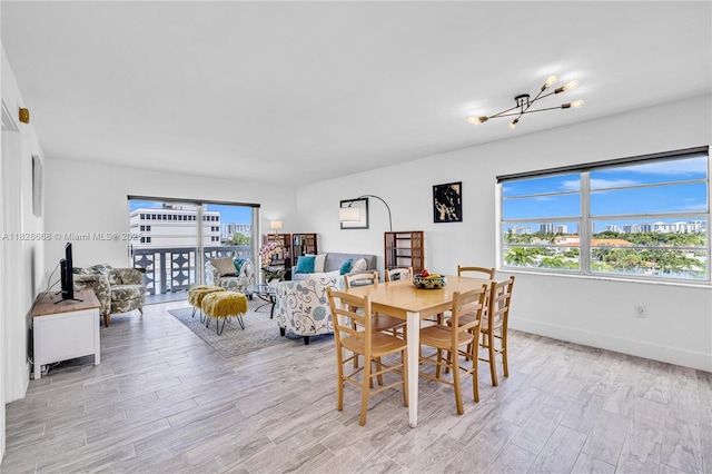 4141 Nautilus Dr Unit 7J, Miami Beach, FL 33140 - dining space featuring light wood-style floors