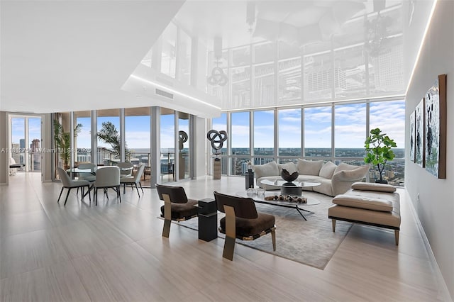 851 NE 1st Ave Unit Ph4912, Miami, FL 33132 - living room featuring a wall of windows and a towering ceiling